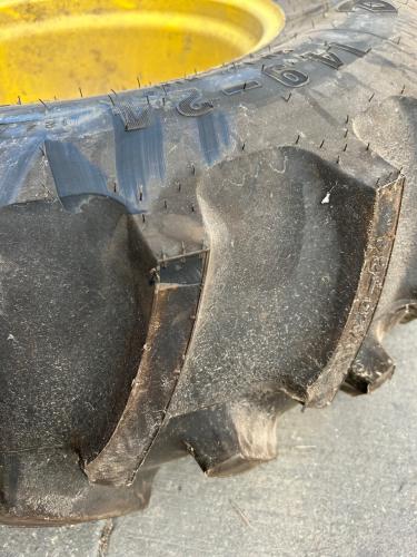 John Deere Firestone 14.9-24 T&W assembly